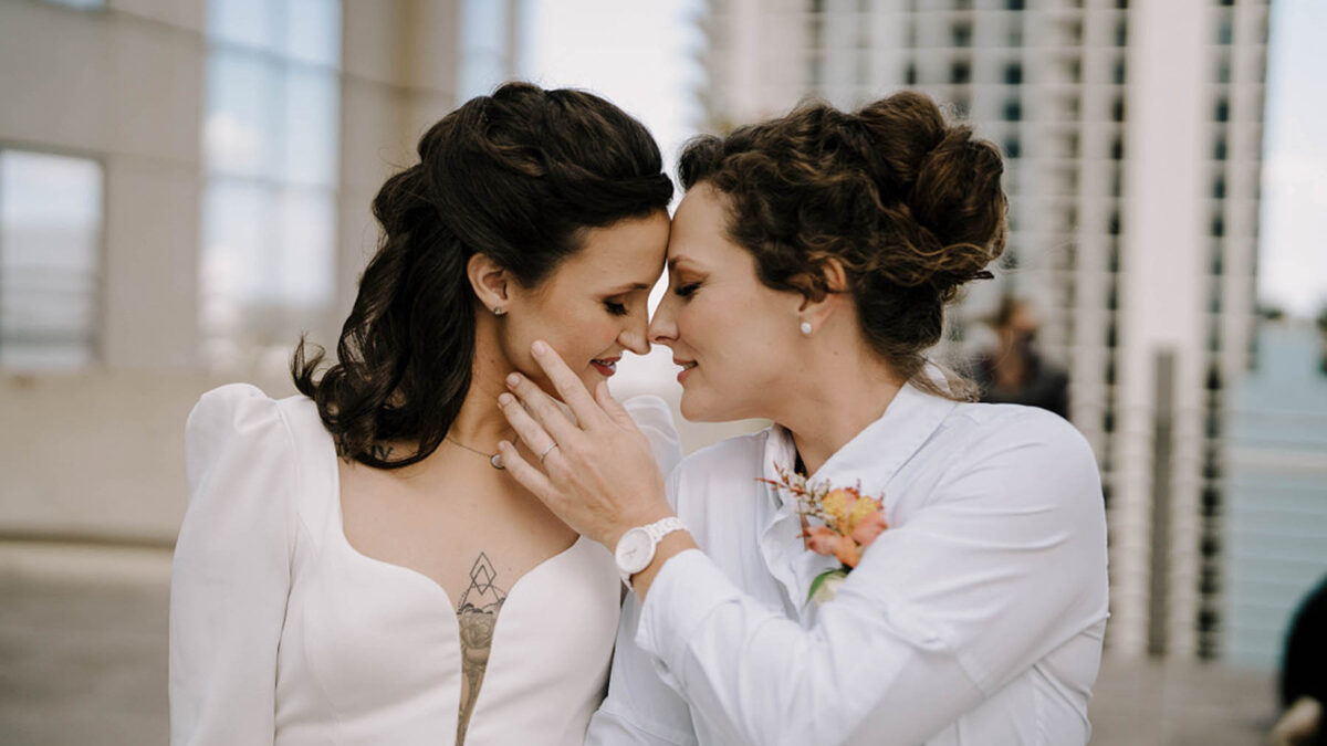 LGBTQ+ wedding inspiration: celebrating queer love with a rooftop party, modern aesthetic and terracotta color palette