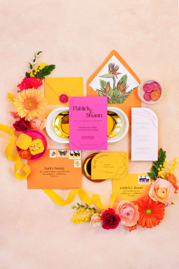 bright pink, orange and yellow wedding invitation suite for spring wedding inspiration