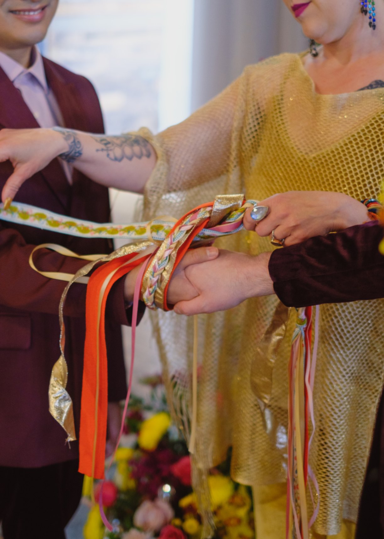 Wedding inspiration for queer love in Seattle with handfasting, a disco ball and vegan donuts