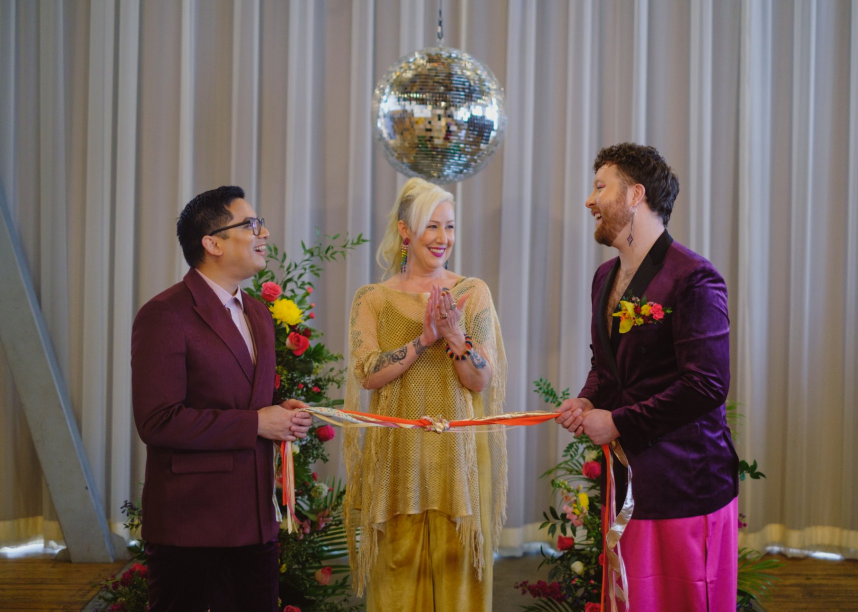 Wedding inspiration for queer love in Seattle with handfasting, a disco ball and vegan donuts