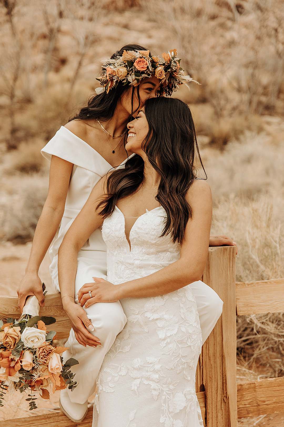 Lesbian brides kiss in Red Rock Canyon State Park.