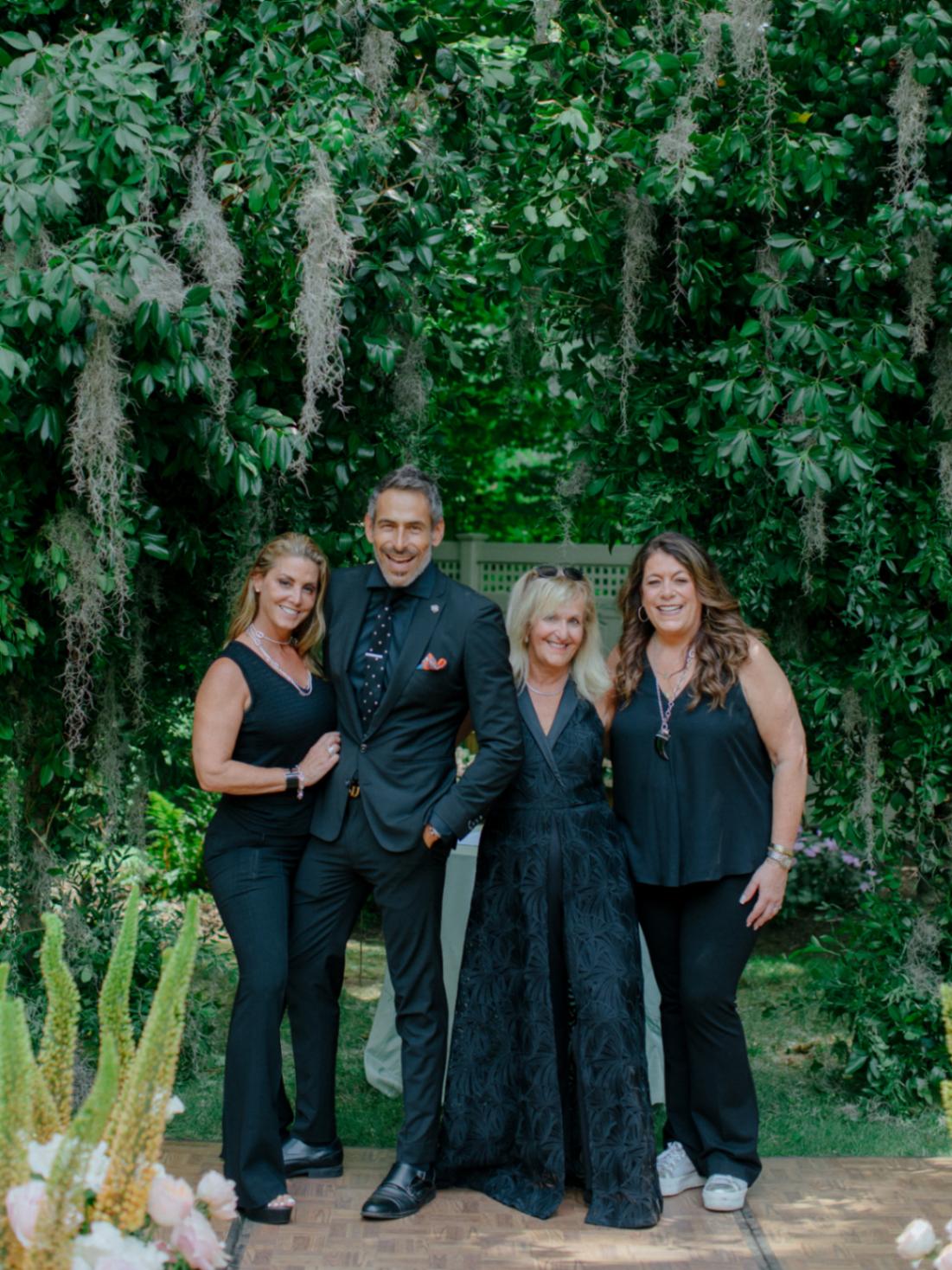 Wedding dream team Jen Gould, Chris J. Evans, JoAnn Gregoli, Robin Selden - One man, three women - all wearing black