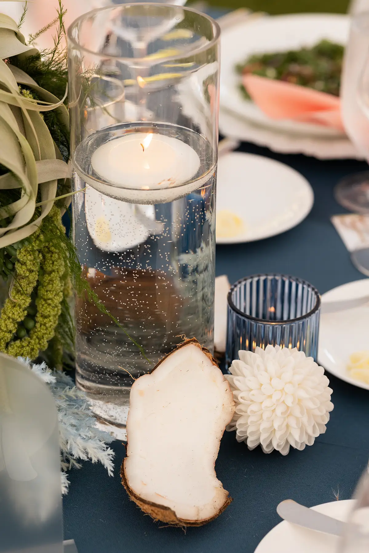 coastal wedding decor ideas with coconut on table