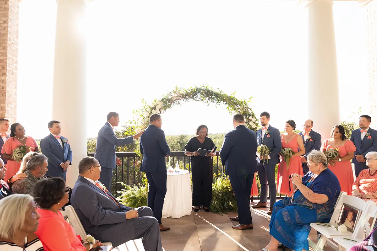 two-grooms-gay-wedding-ceremony-gulf-coast-wedding-in-destin-florida-attendants-blue-coral