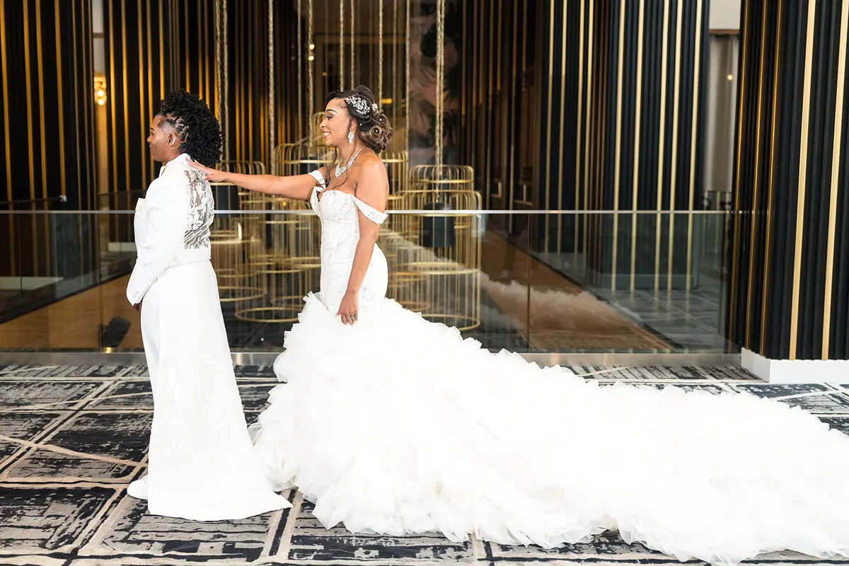 Two Black brides during first look moment at Atlanta lesbian wedding