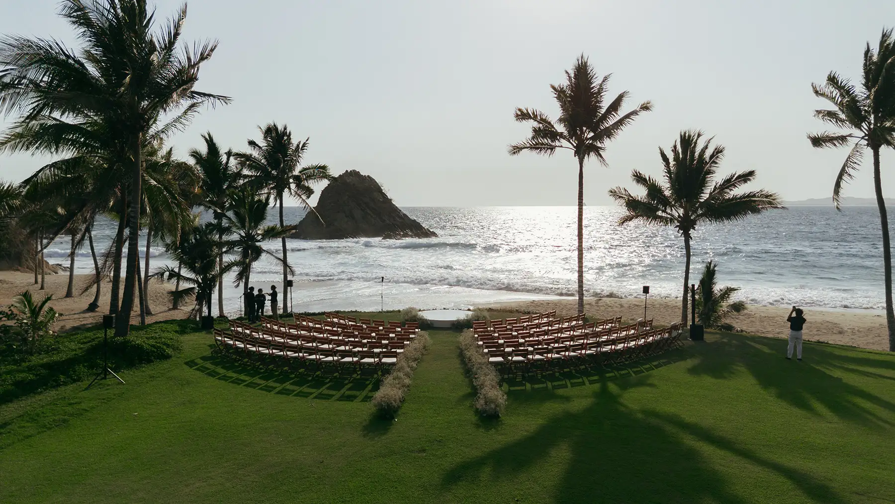 beach wedding ceremony setup with ocean at Four Seasons Tamarindo in Mexico