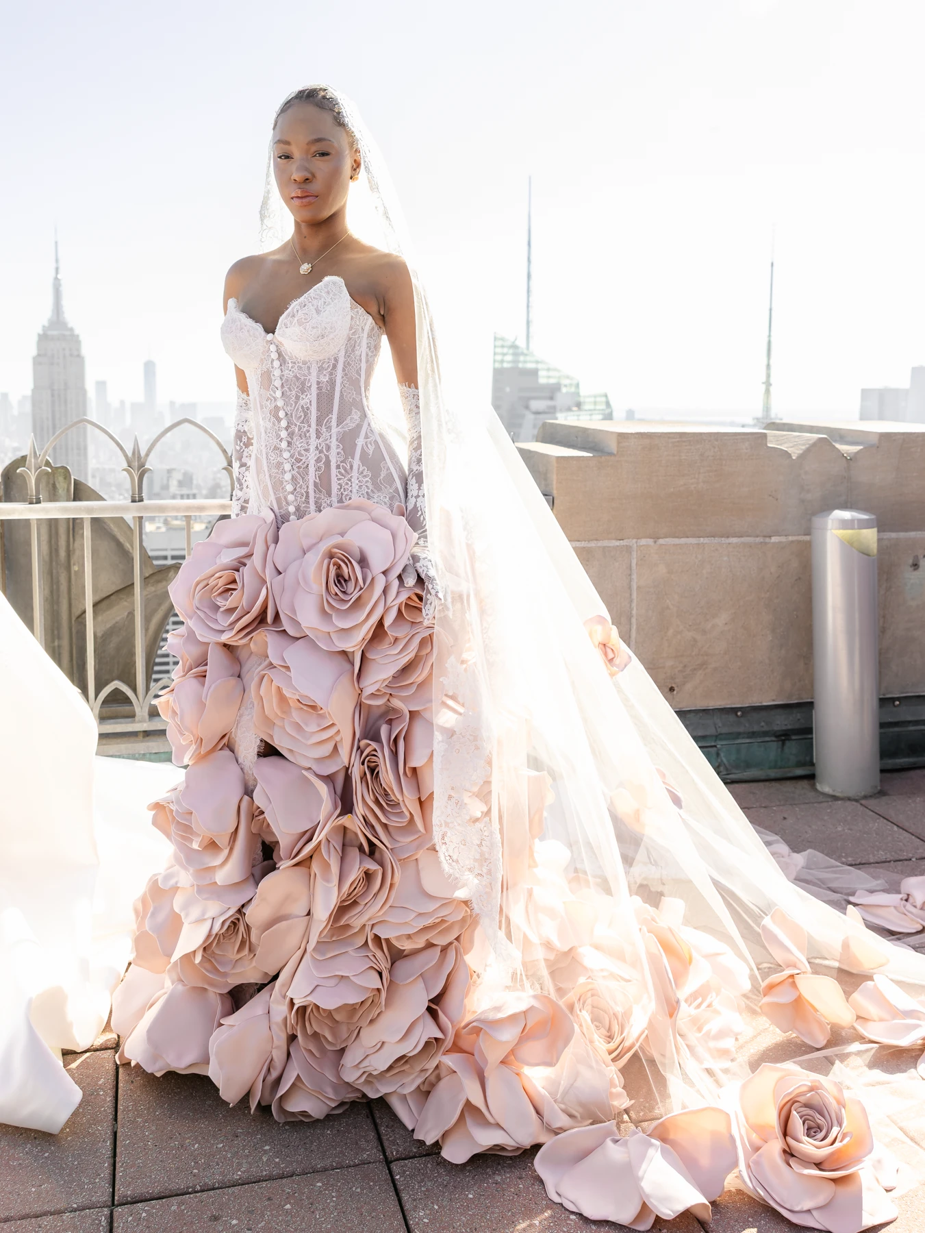 Ese Azenabor wedding gown with large pink flowers, lace and pearls