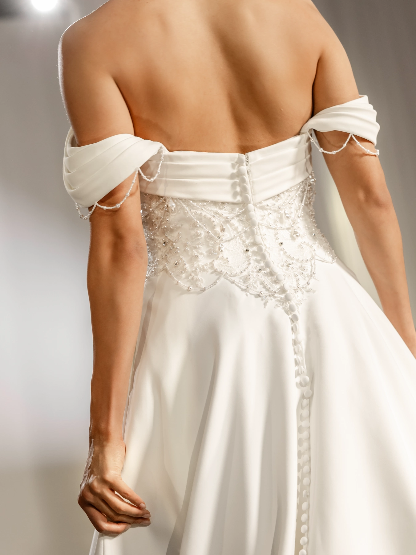 Justin Alexander wedding gown with beaded sleeves