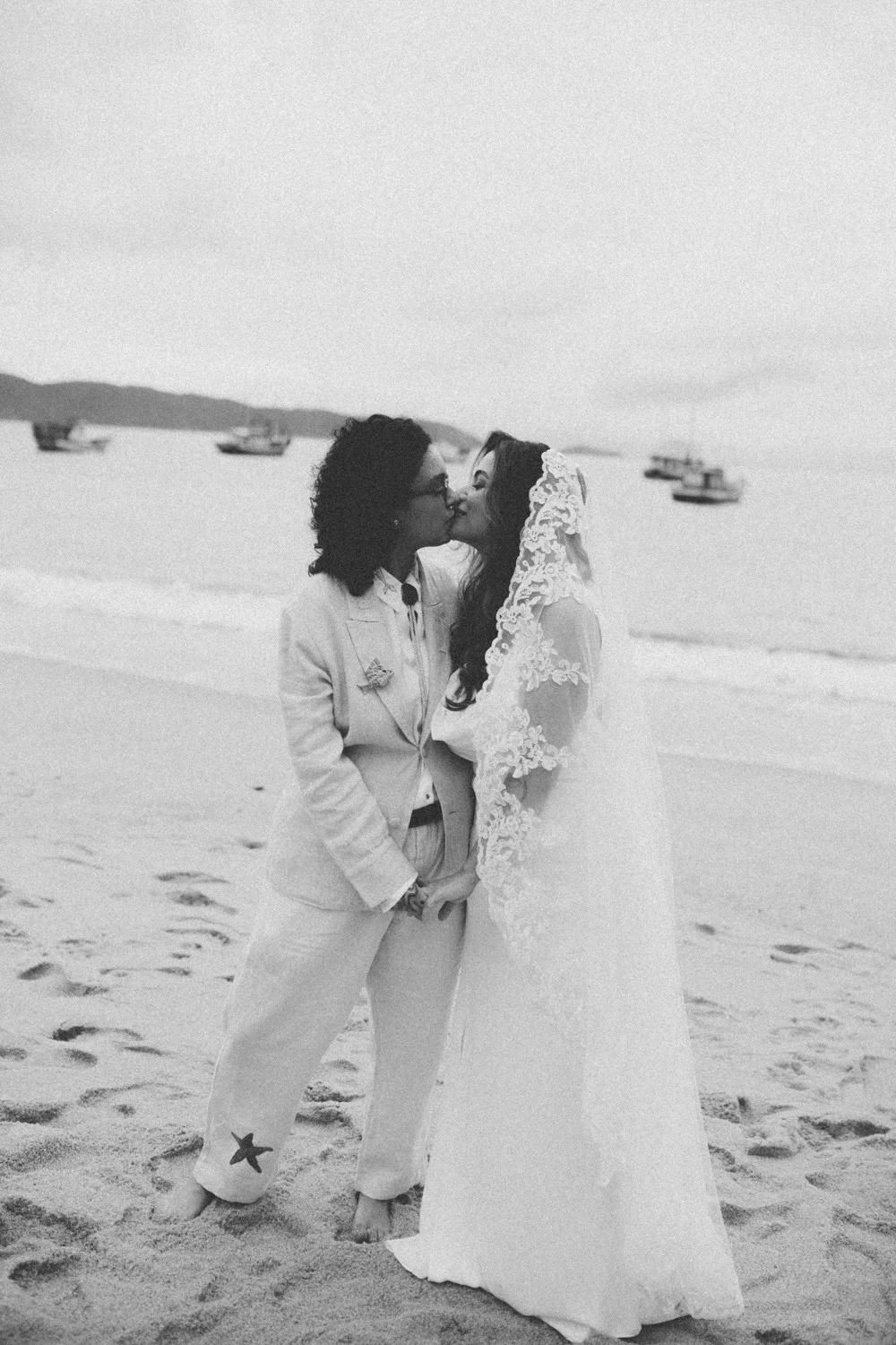 Rafaela and Nathalia share a first kiss on the beach at Pouso das Flores in Paraty, Brazil.