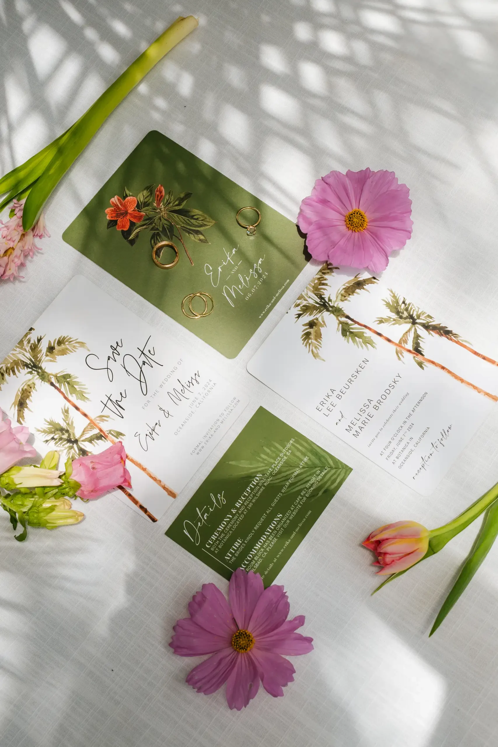 Tropical wedding invitation suite for Erika Beursken and Melissa Brodsky at Botanica in Oceanside, California, with gold rings and pink flowers.