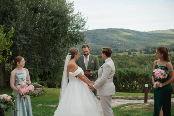 Lauren Thomas and Jasmine Shimerda exchange vows outdoors at Casa Cornacchi in Arezzo, Tuscany, Italy.