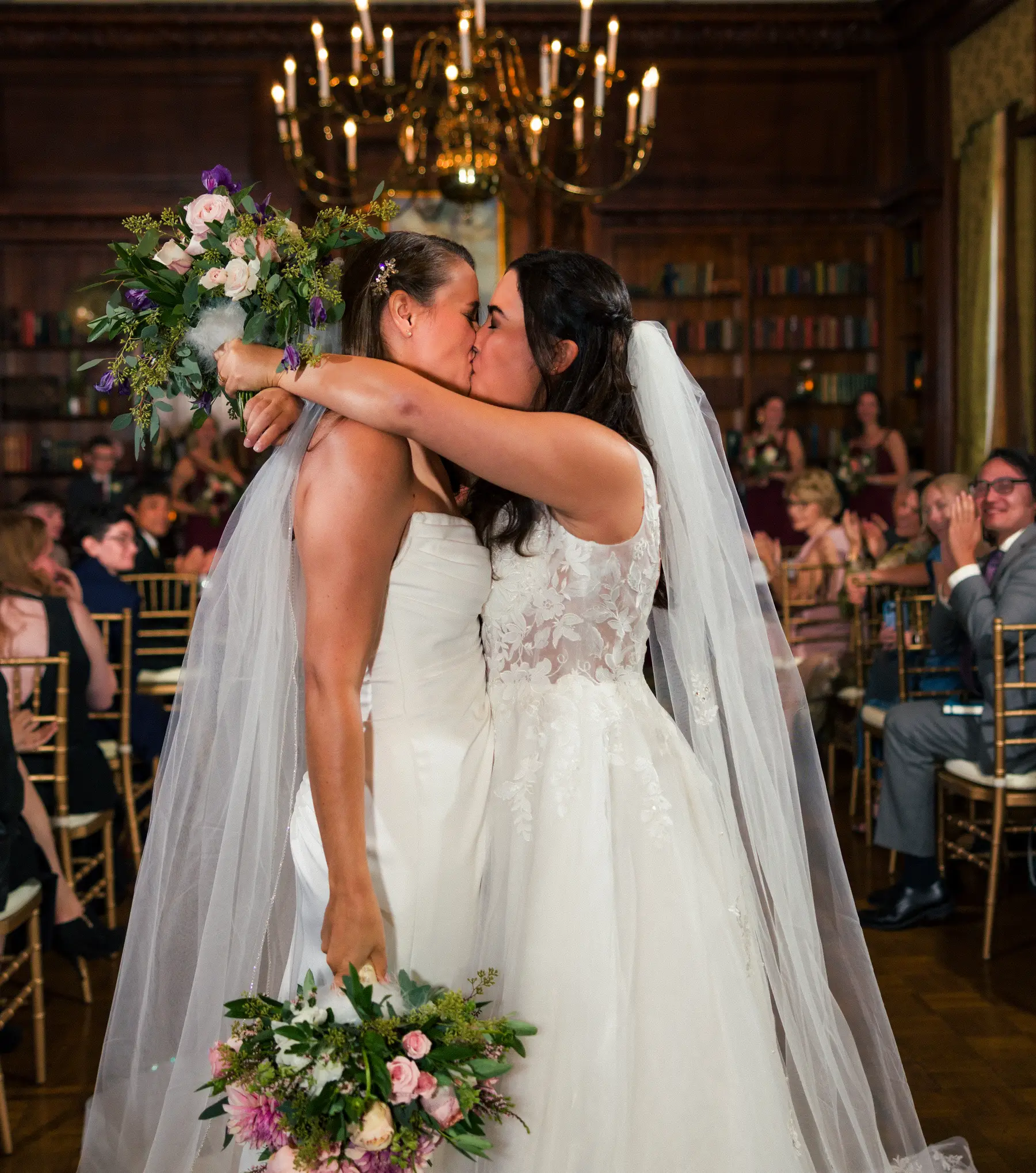Brides Ashton Hattori and Stephanie Tillman share their first kiss at Hampshire House in Boston, MA.