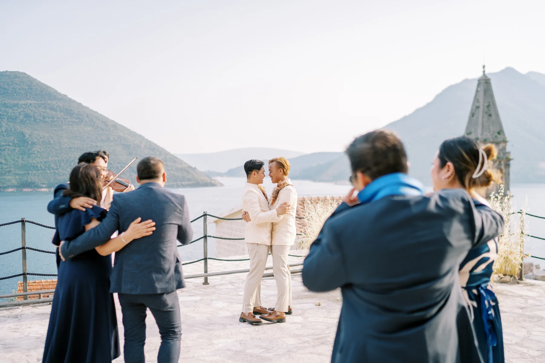 Ryan Jake Pisueña and Jori Blas Lazalita share a first dance on the terrace at Monte Bay Retreat in Perast, Montenegro.