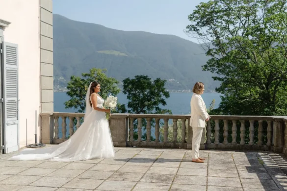 Ashley Rodriguez-Vargas approaches Dionne Vargas for their first look on a terrace at Villa Emden, Brissago Island, Switzerland.