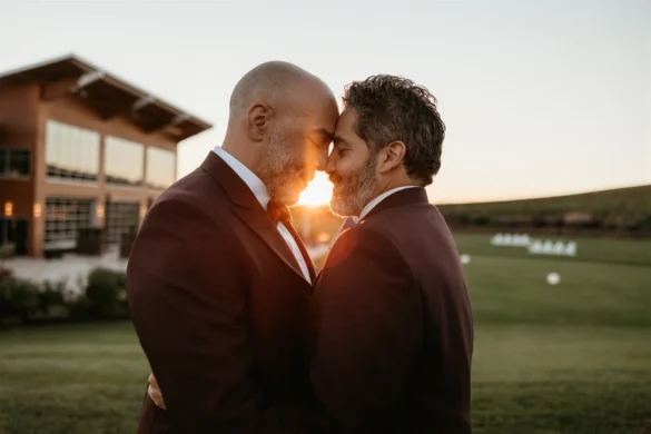 Josue Diaz and Jonathan Snowden touch foreheads at sunset at Stoller Family Estate in Dayton, OR.