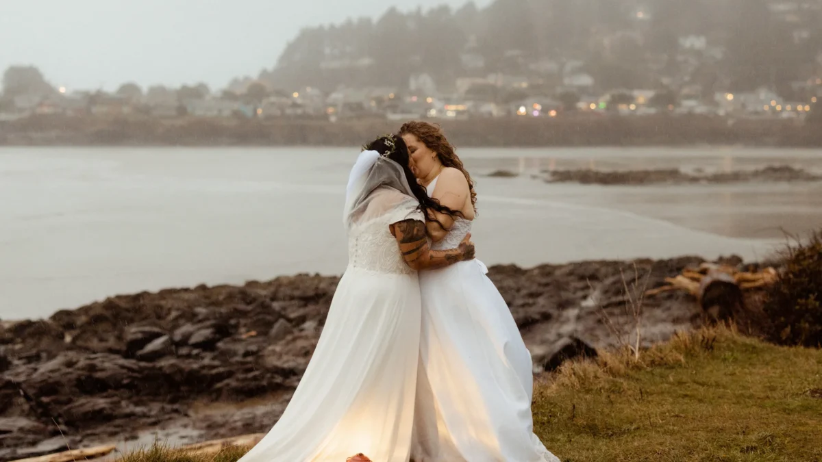 These two brides followed their private vow exchange with a coastal spring DIY wedding in Yachats, Oregon
