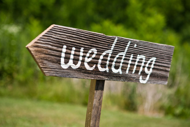 hiring wedding vendors wooden wedding sign