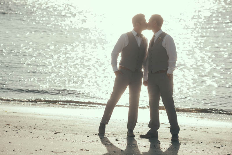 michael-kyle-june-wedding-blueberry-creative-city-grooms-kiss